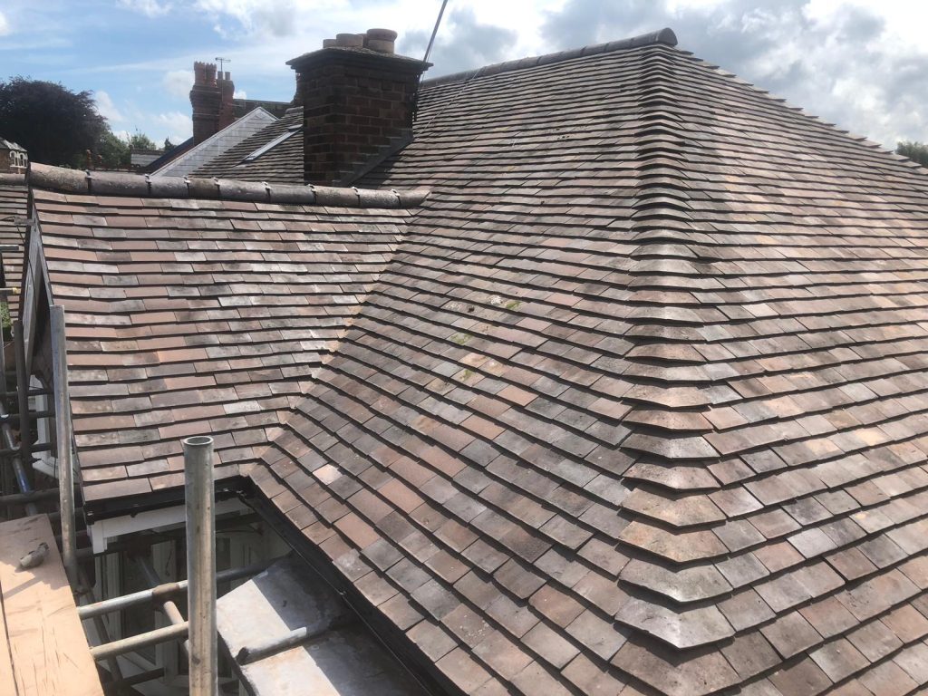 Tiled hip roof on a detached house