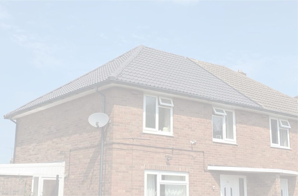 Detached brick house with a tiled roof