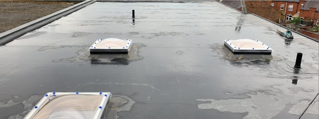New EPDM flat roof with rooflights