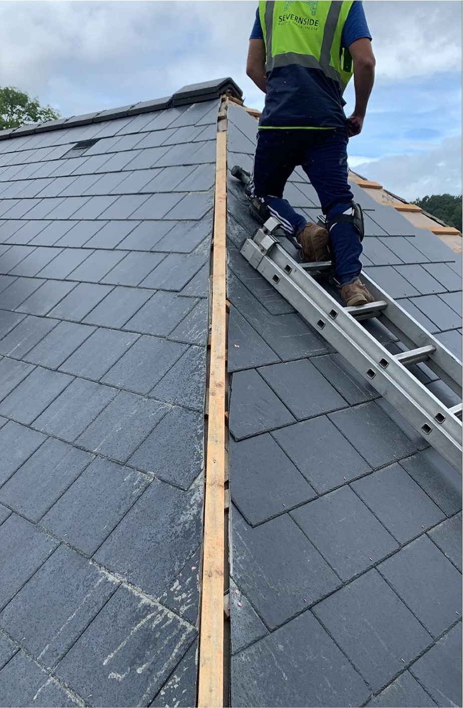 Severnside Roofing team working on a roof in Telford