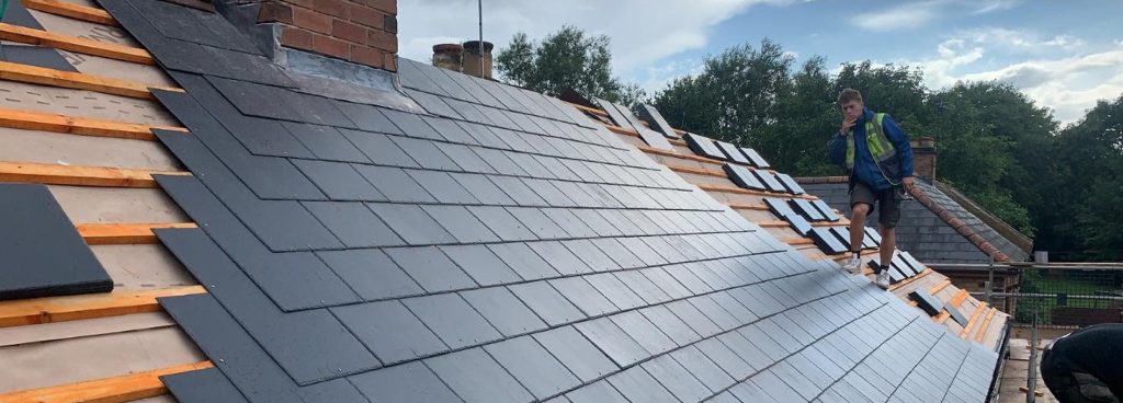 Grey slate roof slope