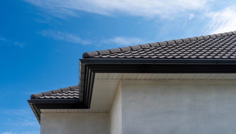 White uPVC fascia, soffit and guttering on a house roofline